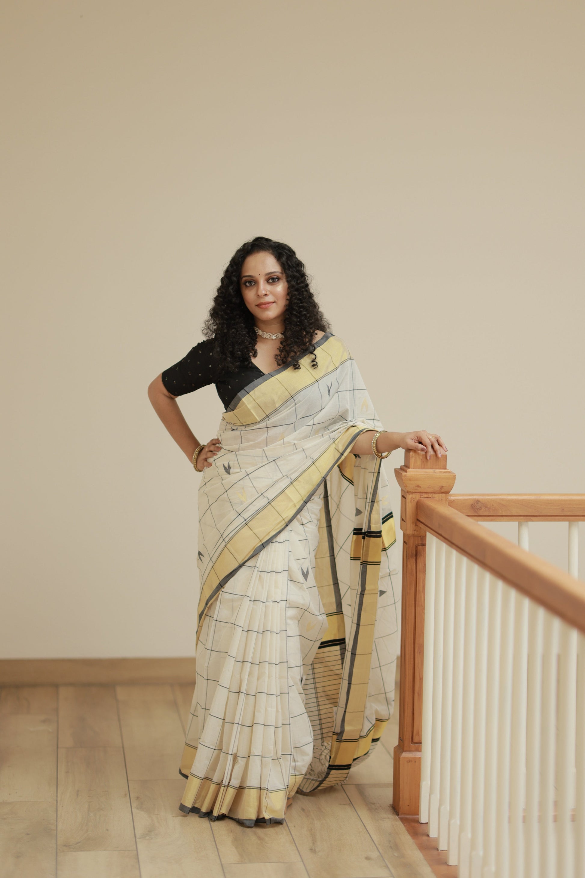 Pure Handloom Black Checks Kasavu Saree draped on model, full-length front view showing black checks and golden kasavu border