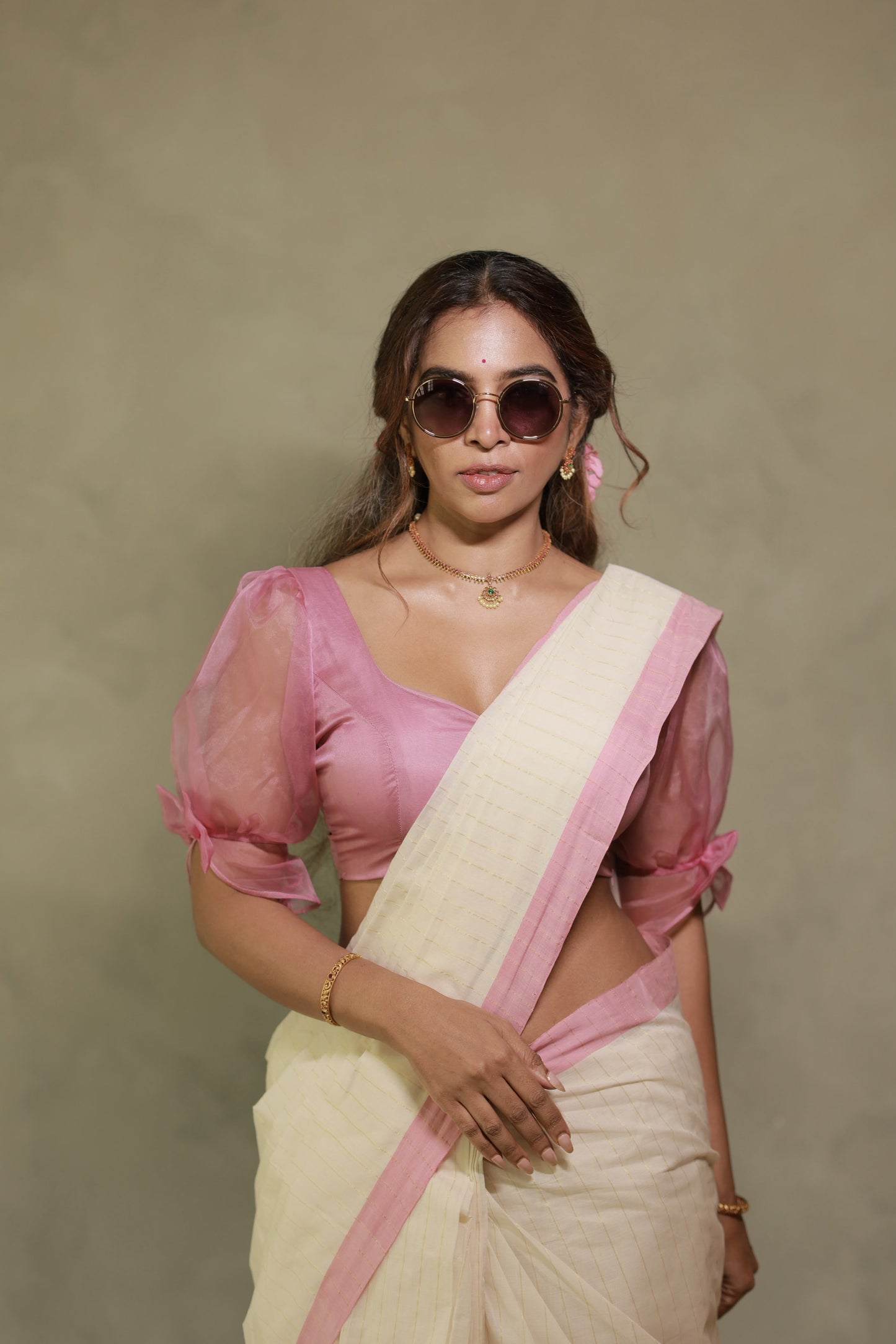Pure Handloom Pink Striped Kasavu Saree, front view showing the golden kasavu stripes and lotus pink kara